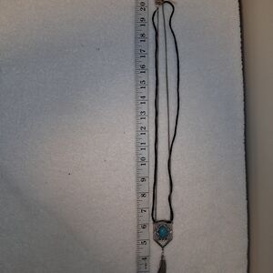 Elegant Silver and Turquoise Pendant Necklace